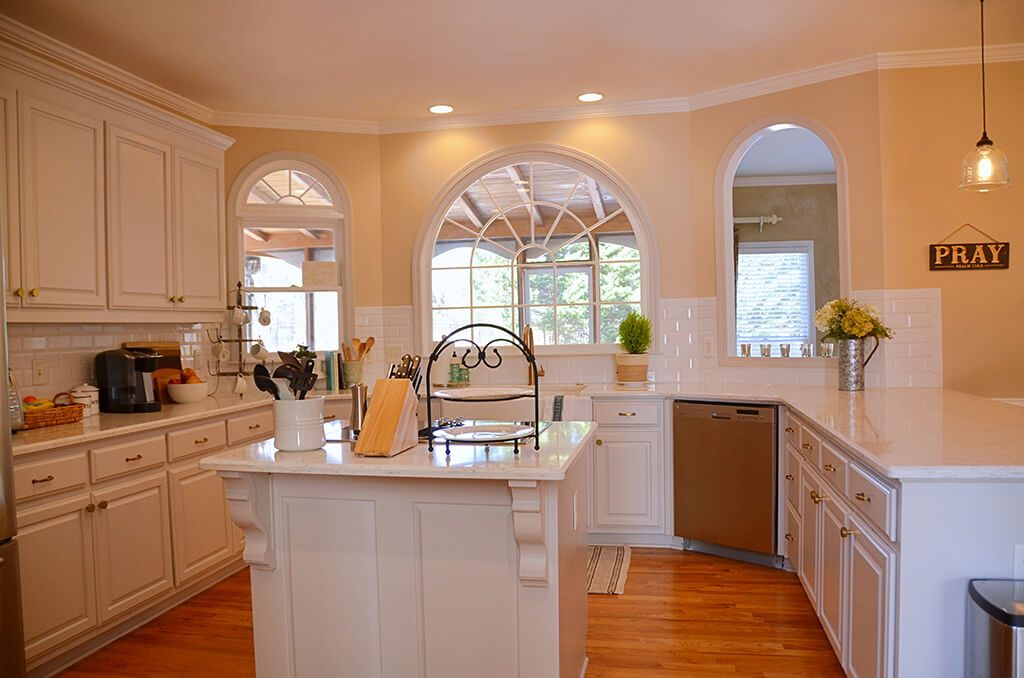 Kitchen Remodel in Roswell with new cabinets and doors with corbels