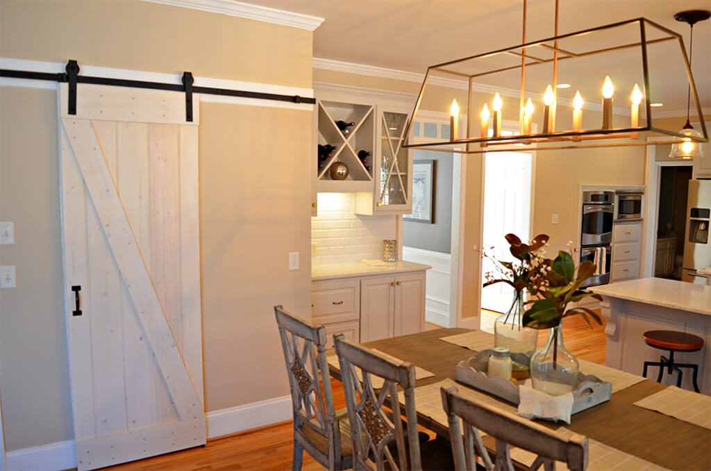 Kitchen Remodel in Roswell has resized pantry and new lighting